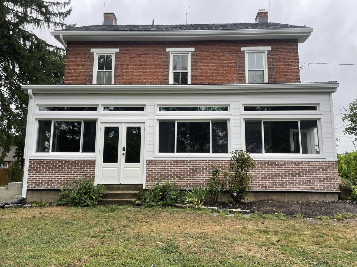 Home addition with new siding and windows completed by DeHaas Building and Remodeling