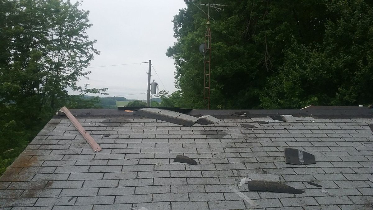 Roof shingle repair in progress
